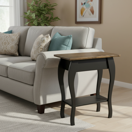 Gray sofa with decorative pillows and a wooden side table in a living room setting.