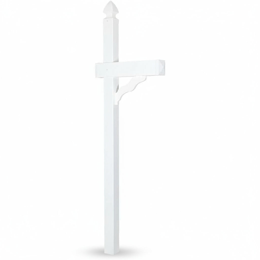 White mailbox on a grassy lawn in front of a brick house